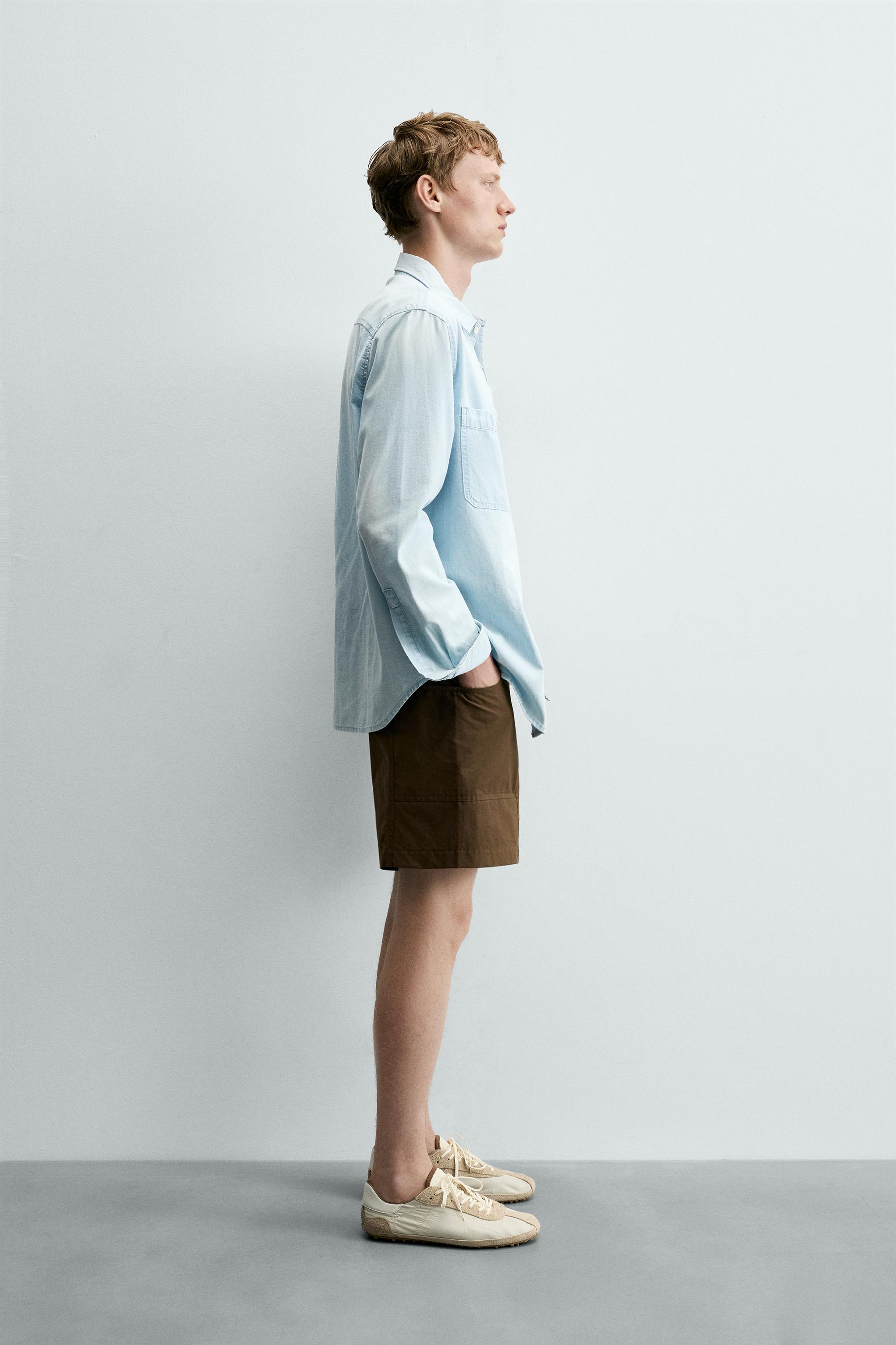 SEAMED SWIM SHORTS